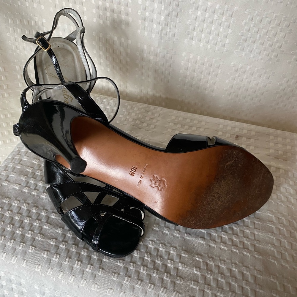 Black patent leather dress shoes with high heel